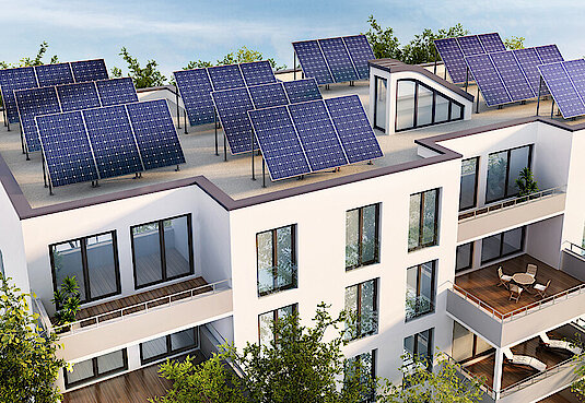 Bild mit heller Häuserreihe und Solaranlagen auf dem Dach